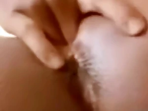 Cute Diabolical teen fingers herself close-up in English videotape